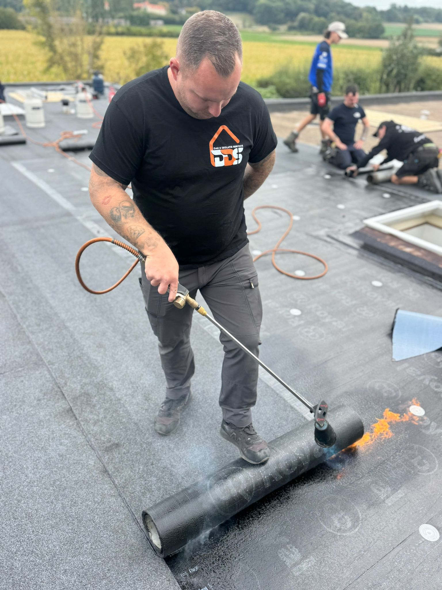 Dakdekker aan het werk – DDS Dak & Isolatie Service
